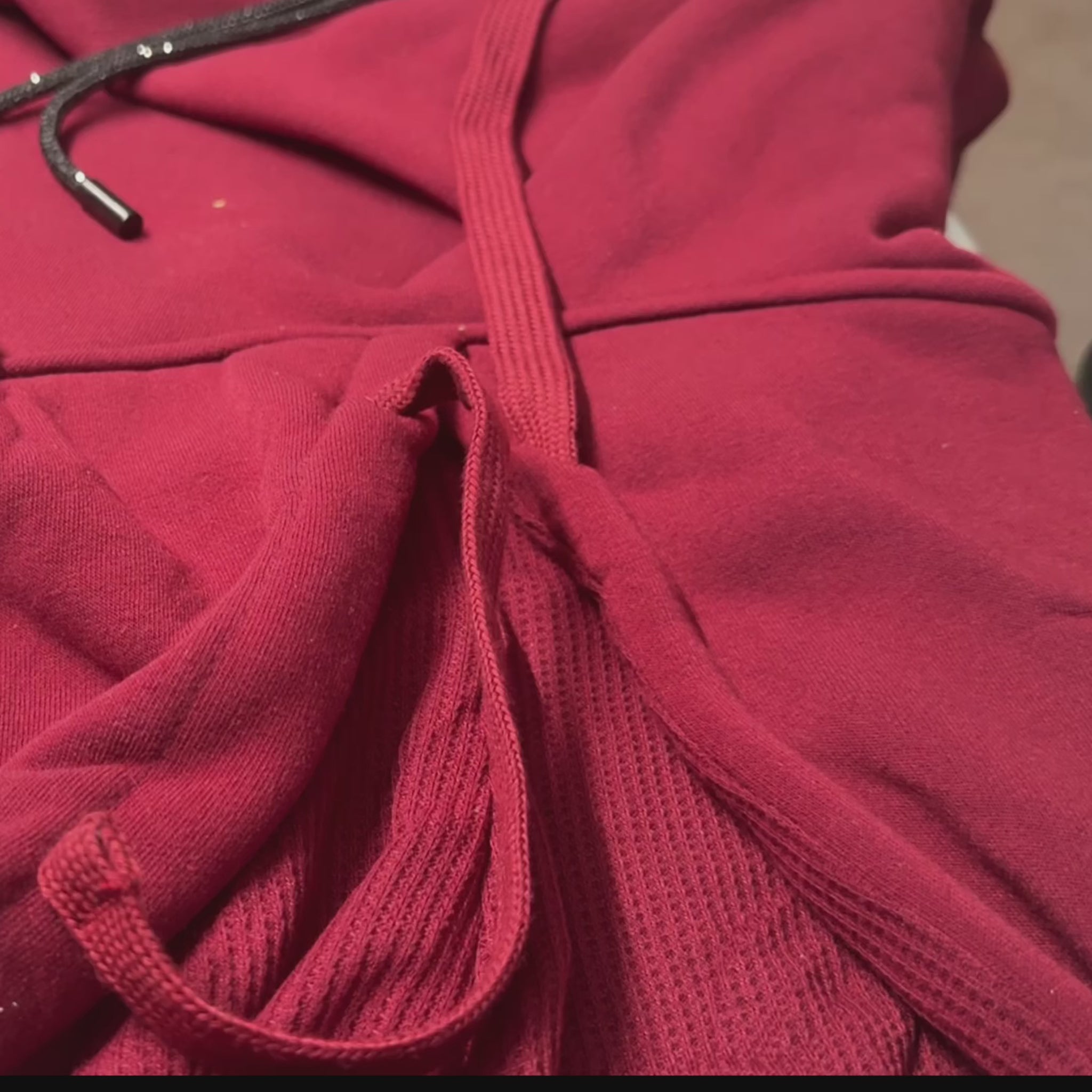 video showing how to place the rhinestone hoodie strap in your favorite hoodie.